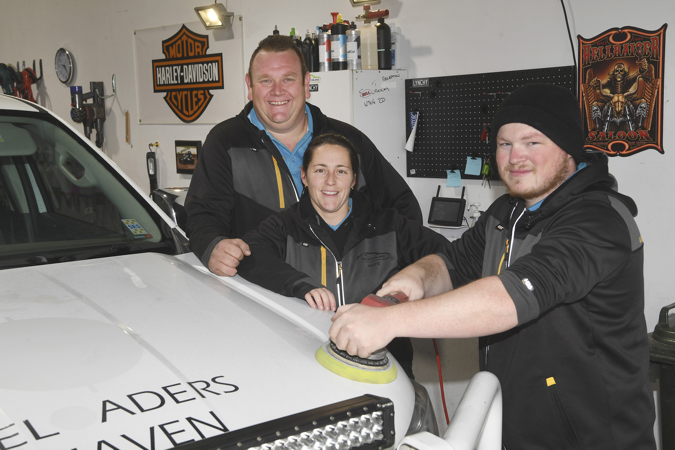 Rodney Ough, Kate Ough and Michael Freeth photographed with car